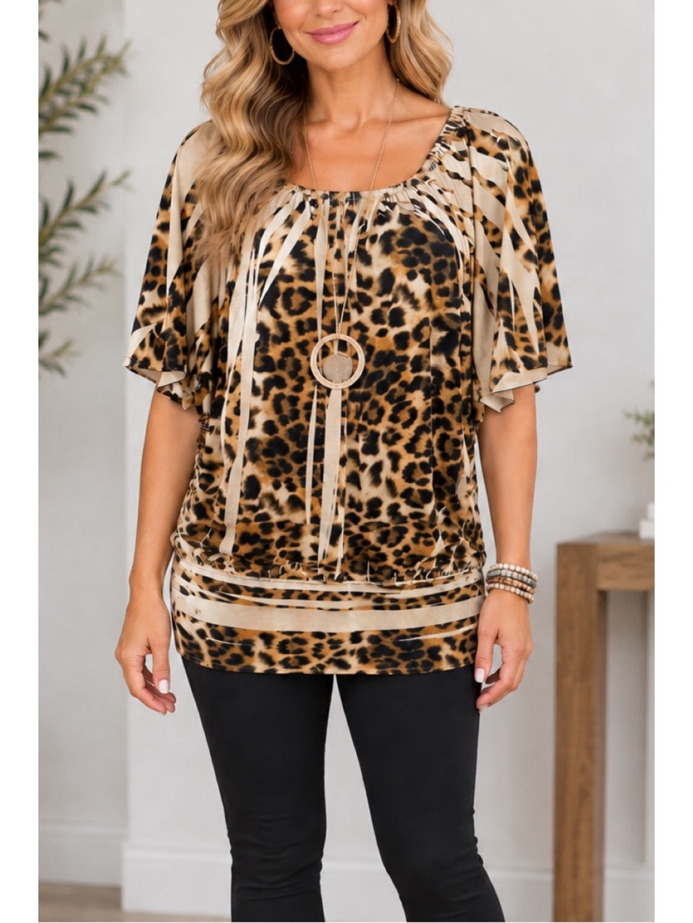 Studio Y leopard print tunic top, designed with a flowing silhouette